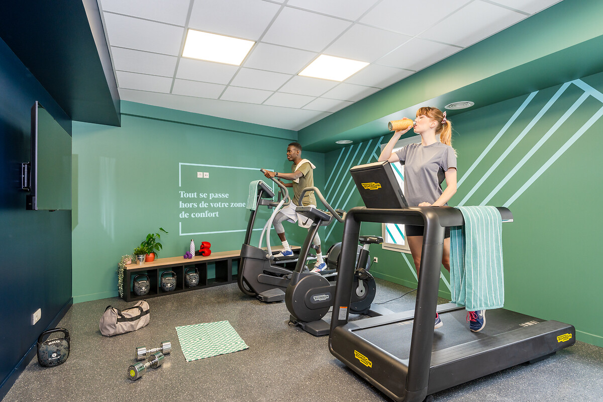 Equipped fitness room of the student residence Cite Cinma Paris St Denis
